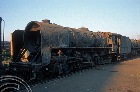 FR0496. YG 2-8-2 No 4138 Dumped at the rear of the shed. Wankaner Junction. Gujarat. India. 13.02.2000.