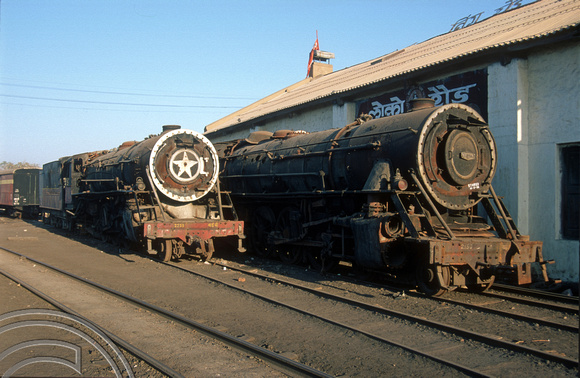 FR0516. YP 4-6-2s No's 2233 and 2150. Dumped wheeless at the rear of the shed. Wankaner Junction. Gujarat. India. 13.02