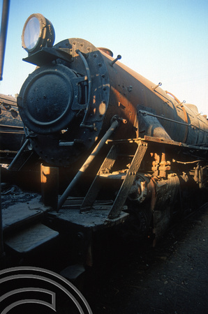 FR0514. YP 4-6-2s No 2211. Dumped wheeless at the rear of the shed. Wankaner Junction. Gujarat. India. 13.02