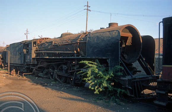 FR0544. YG 2-8-2 No 4138. Dumped at the rear of the shed. Wankaner Junction. Gujarat. India. 13.02