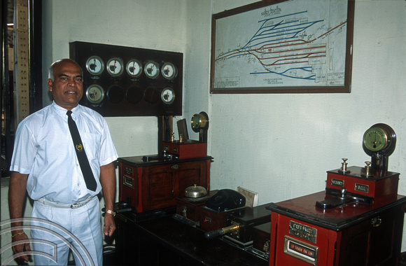 FR0838. Stationmaster Mr Wijesekar with token equipment. Kandy. Sri Lanka. 01.01.2003