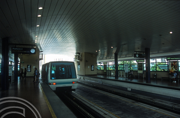FR1121. Bukit Panjang LRT. Passengers detrain at Bukit Panjang. Singapore. 09.09.2003