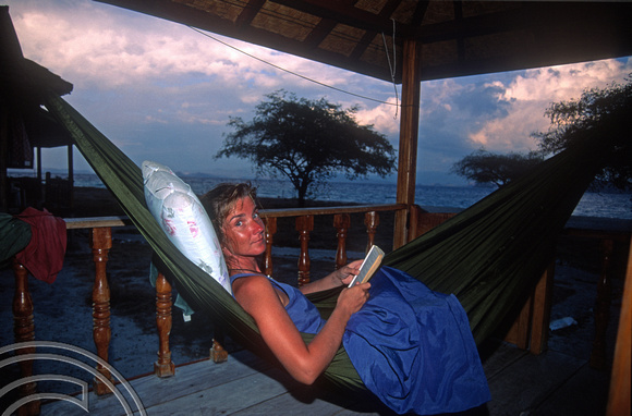 T7868. Lynn in a hammock. Kanawa Island. Flores. Indonesia. September 1998