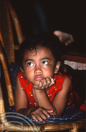 T7944. Young Balinese girl watching the dancers. Lovina. Bali. Indonesia. 15th October 1998