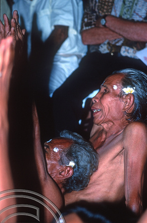 T7989. Kecak dance. Old man. Ubud. Bali. Indonesia. 19th October 1998