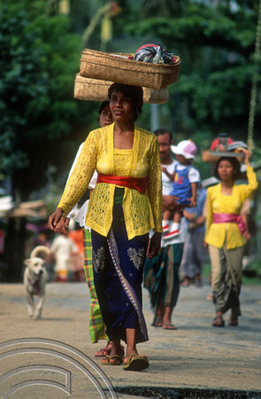 T8149. Woman on the way to the temple. Padangbai. Bali. Indonesia. November 1998