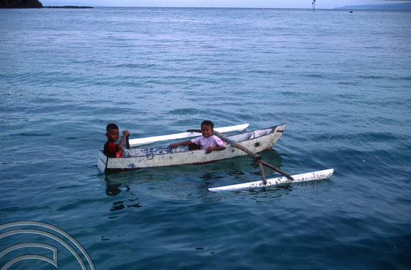 T8160. Children in a boat. Padangbai. Bali. Indonesia. November 1998