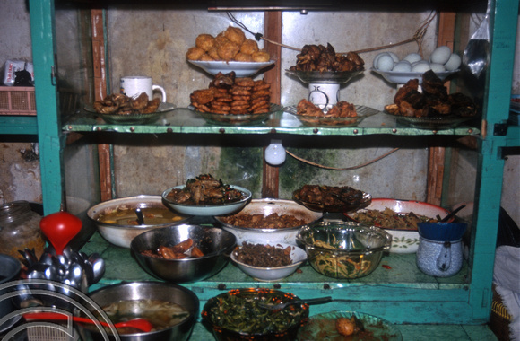 T8339. Food stall in a 'gang' (alley). Yogyakarta. Java. Indonesia. November 1998