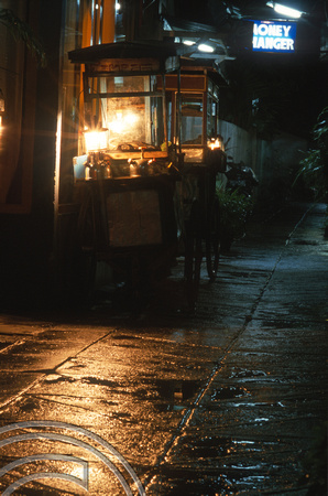 T8350. Hawker stall on a rainy night. Yogyakarta. Java. Indonesia. November 1998
