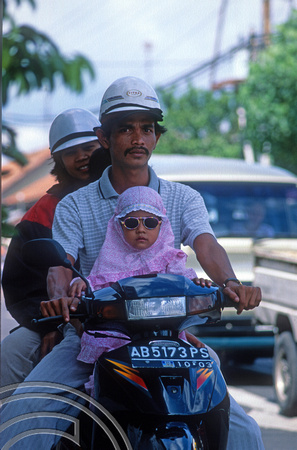T8380. Family on a motorcycle. Yogyakarta. Java. Indonesia. November 1998