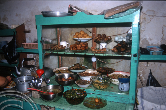T8338. Food stall in a 'gang' (alley). Yogyakarta. Java. Indonesia. November 1998