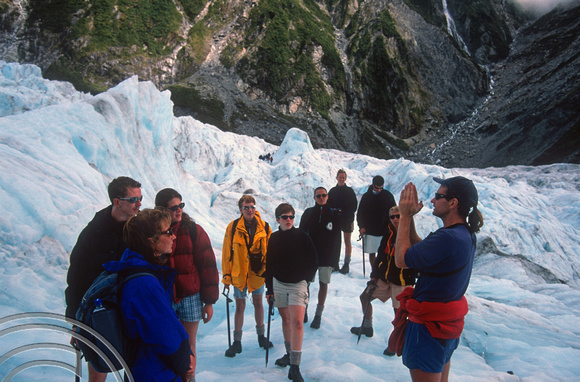T8918. Our Guide explains. Franz Josef Glacier. South Island. New Zealand. 20th February 1999