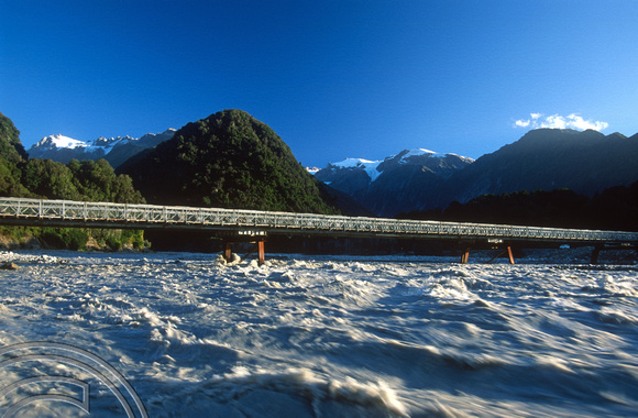 T8946. Glacial water under the bridge. Franz Josef Glacier. South Island. New Zealand. 20th February 1999