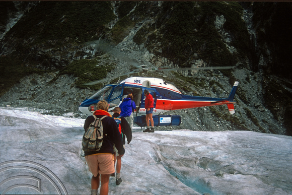 T8935. Getting back in the helicopter. Franz Josef Glacier. South Island. New Zealand. 18th February 1999