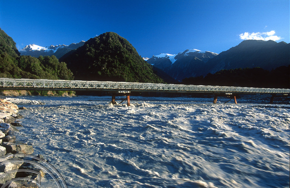 T8943. Glacial water under the bridge. Franz Josef Glacier. South Island. New Zealand. 20th February 1999