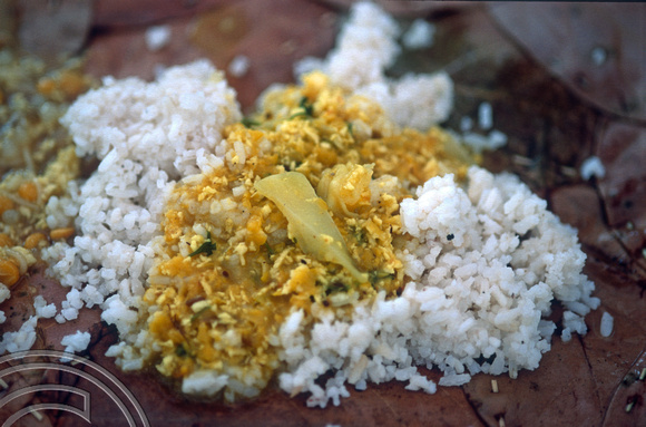 T9258. Food served at a temple festival. Arambol. Goa. India. 21st January 2000