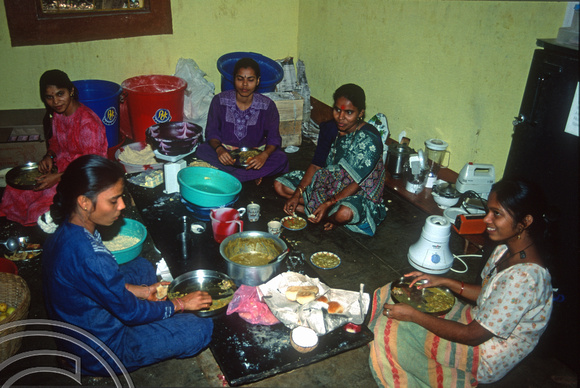 T9302. Girls cooking. Double Dutch restaurant. Arambol. Goa. India. 27th January 2000