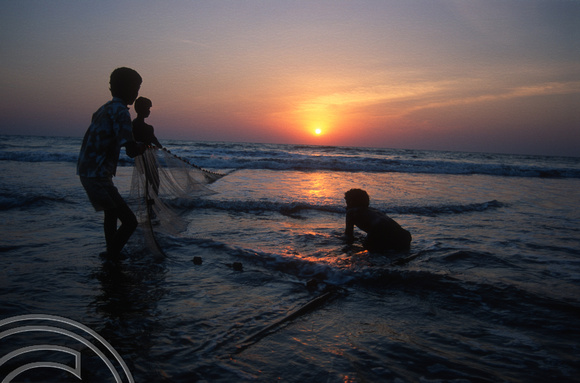 T9311. Fishing at sunset. Arambol. Goa. India. 27th January 2000.