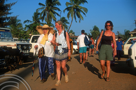 T9399. Strolling through. Vagator. Goa. India. 1st February 2000
