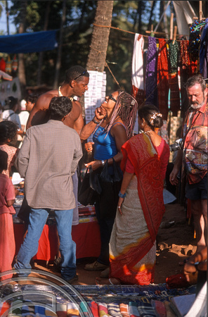 T9434. People. Anjuna flea market. Goa. India. 2nd February 2000