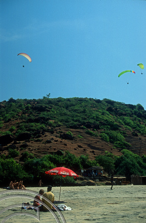 T9456. Paragliders over little beach. Arambol. Goa. India. 4th February 2000