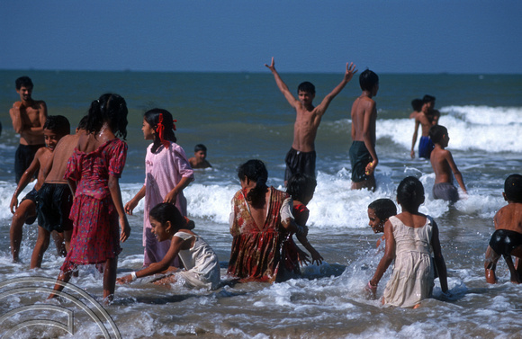 T9510. Children bathing at the festival. Arambol. Goa. India. 5th February 2000