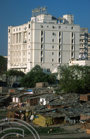T9740. Slums on the riverbank under the Holiday Inn. Ahmedabad. Gujarat. India. 15th February 2000