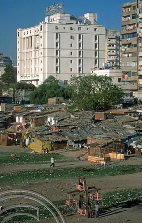 T9737. Slums on the riverbank under the Holiday Inn. Ahmedabad. Gujarat. India. 15th February 2000