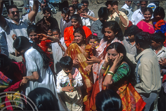 T9783. Dancing in a wedding procession. Bhavnagar. Gujarat. India. 19th February 2000