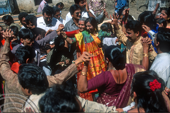 T9782. Dancing in a wedding procession. Bhavnagar. Gujarat. India. 19th February 2000
