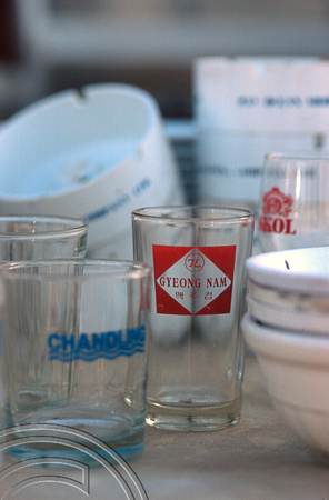 T9775. Ashtrays and glasses from broken-up ships. Alang. Gujarat. India. 18th February 2000