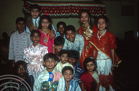 T9801. Group at a wedding procession. Bhavnagar. Gujarat. India. 19th February 2000