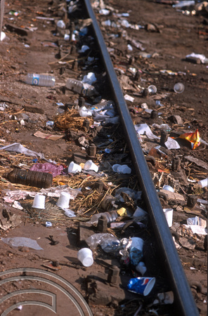 T9856. Rubbish on the track at the station. Ahmedabad. Gujarat. India. 21st February 2000