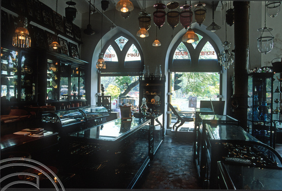 T9921. Inside Phillips antique shop. Mumbai. India. 23rd February 2000