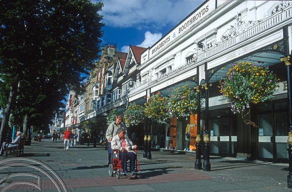 T10084. View along the canopies, including Debenhams. Lord St. Southport. England. 28th August 2000