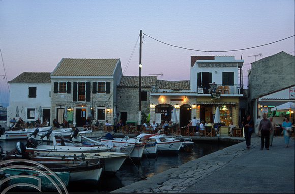 T10161. Early evening on the harbour front. Loggos. Paxos. Ionian Isles. Greece. 24th September 2000