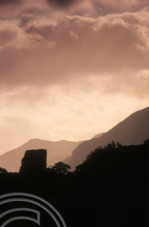T10235. Moody clouds over Dolbardarn Castle. Llanberis. Wales. 25th October 2000