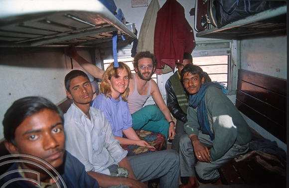 T4248. Lynn and I with mining students on the train to Jaisalmer. Pokaran. Rajasthan. India. 15th December 1993