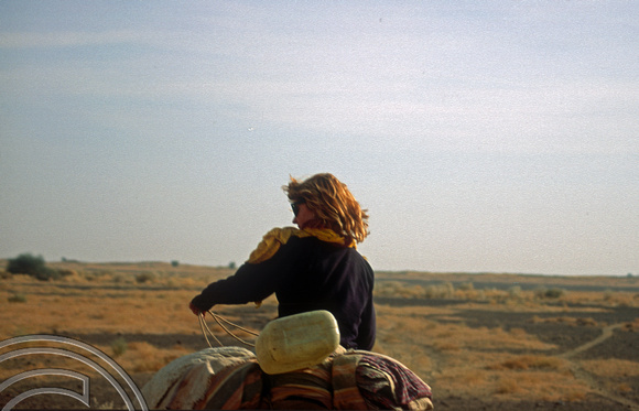 T4361. Lynn riding a camel. Thar desert. Rajasthan. India. December 1993.