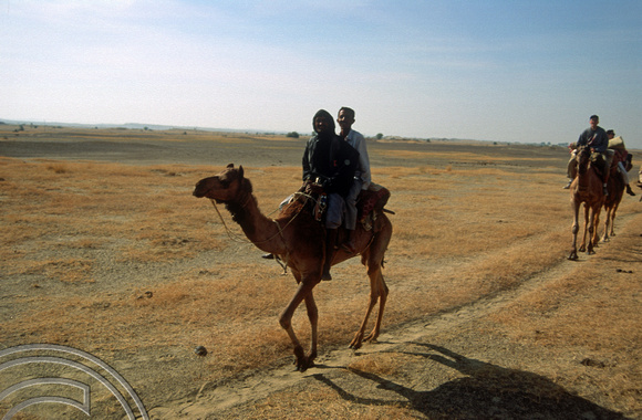 T4368. Riding a camel. Thar desert. Rajasthan. India. December 1993.