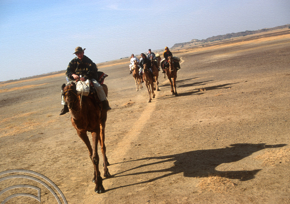 T4370. Riding a camel. Thar desert. Rajasthan. India. December 1993.