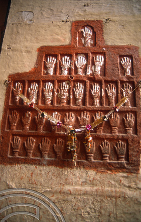 T4387. Suttee handprints on the fort wall. Jodhpur. Rajasthan. India. December 1993.