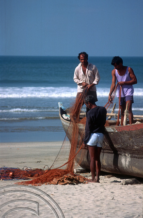 T4426. Loading the fishing nets. Arambol. Goa. India. December 1993.