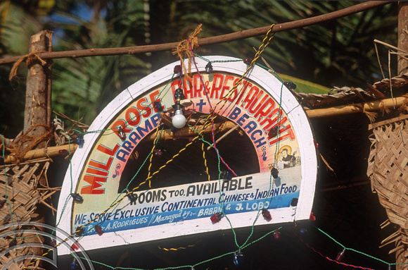 T4430. Beach restaurant sign. Arambol. Goa. India. December 1993.