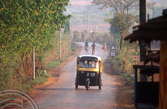 T4448. Motor rickshaw on a quiet road. Arambol. Goa. India. December 1993.