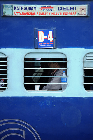 DG75664. Waiting for the express to leave. Delhi Jn. India. 1.3.11