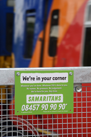 DG179711. Samaritans sign.   Clapham Junction. 21.5.14.