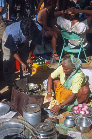 T5600. Old woman's chai stall. The flea market. Anjuna. Goa. India. December 1995