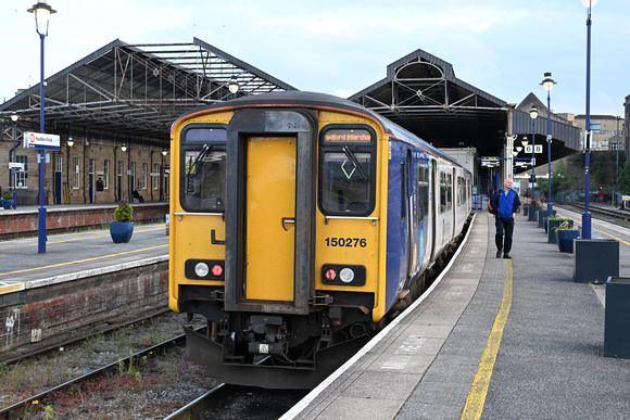 DG418876. 150276. 2W28. 2035 Huddersfield to Bradford Interchange. Huddersfield. 6.6.2024.