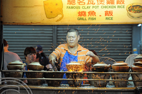 DG101257. Clay pot cooking. Chinatown. KL. Malaysia. 15.1.12.